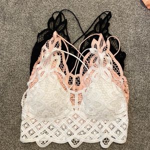 A set of 3 SIZE MEDIUM bralettes. Brand new never worn.